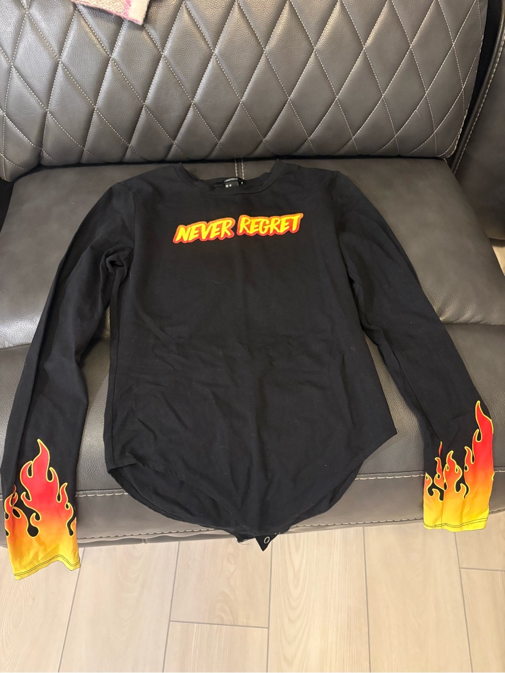 Forever 21 Black 'Never Regret' Long-Sleeve Bodysuit with Flame Cuffs